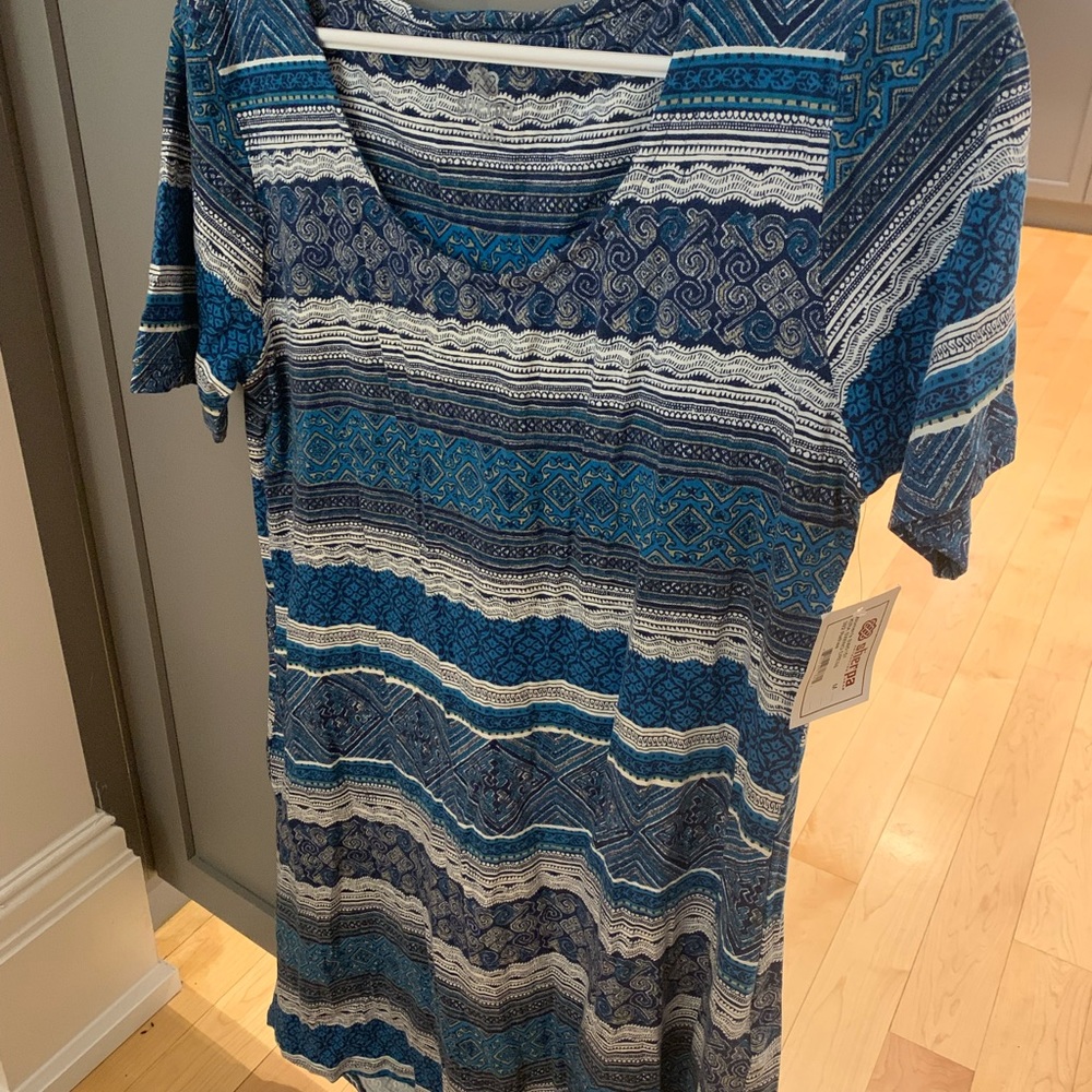 Sherpa Adventure Gear Kira Swing dress, brand new with tags still on. Size M